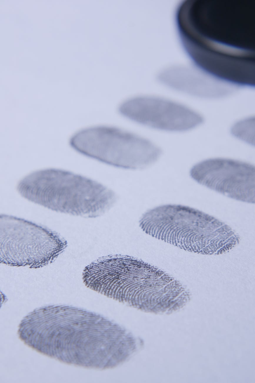 close up of fingerprints on white background