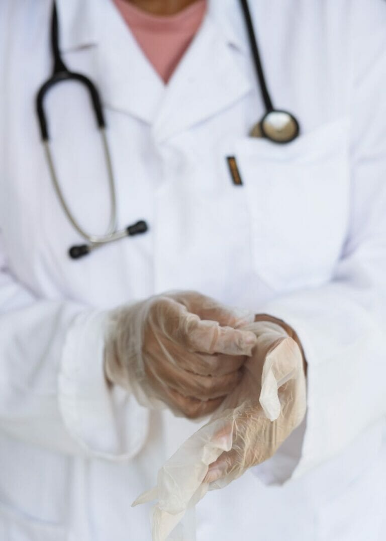 crop doctor with stethoscope preparing for surgery in hospital