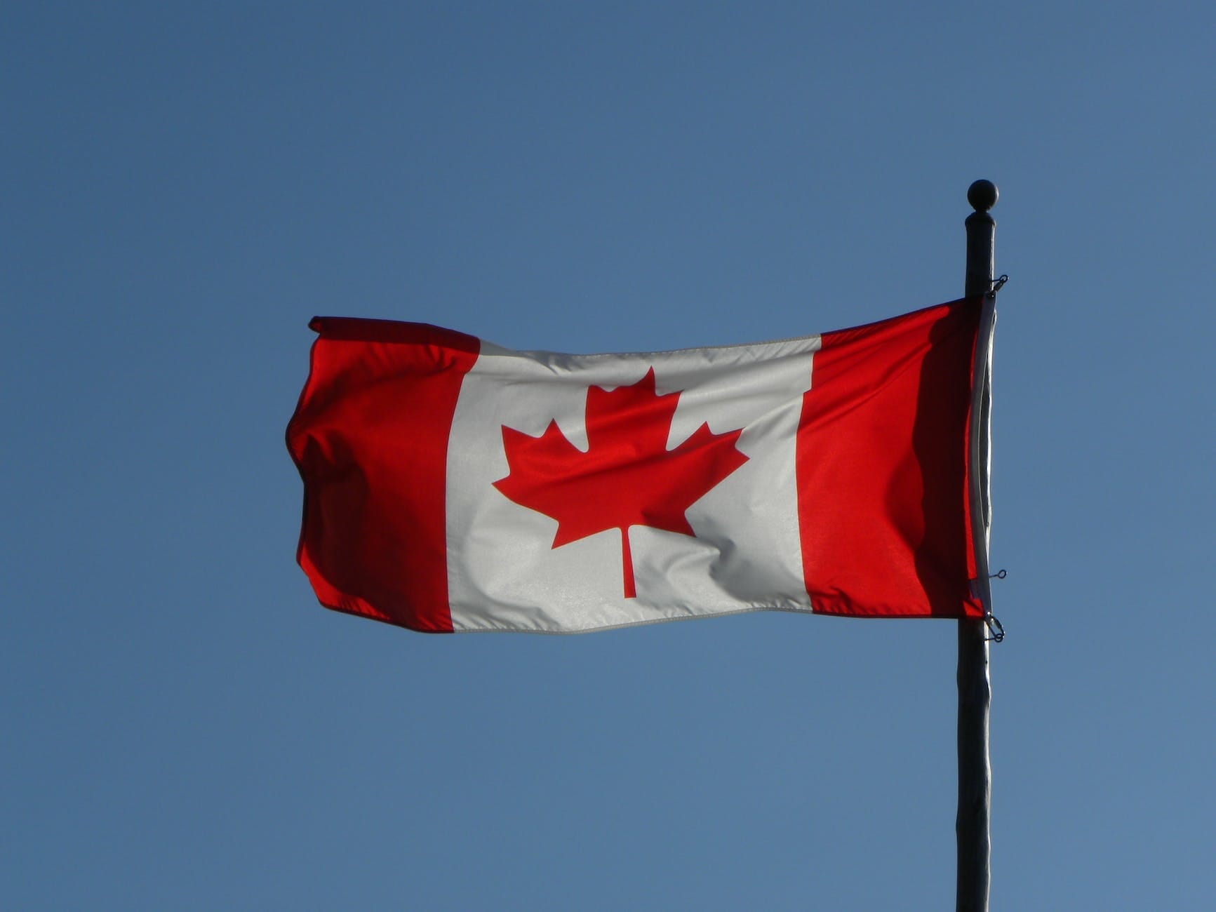 canadian flag on pole