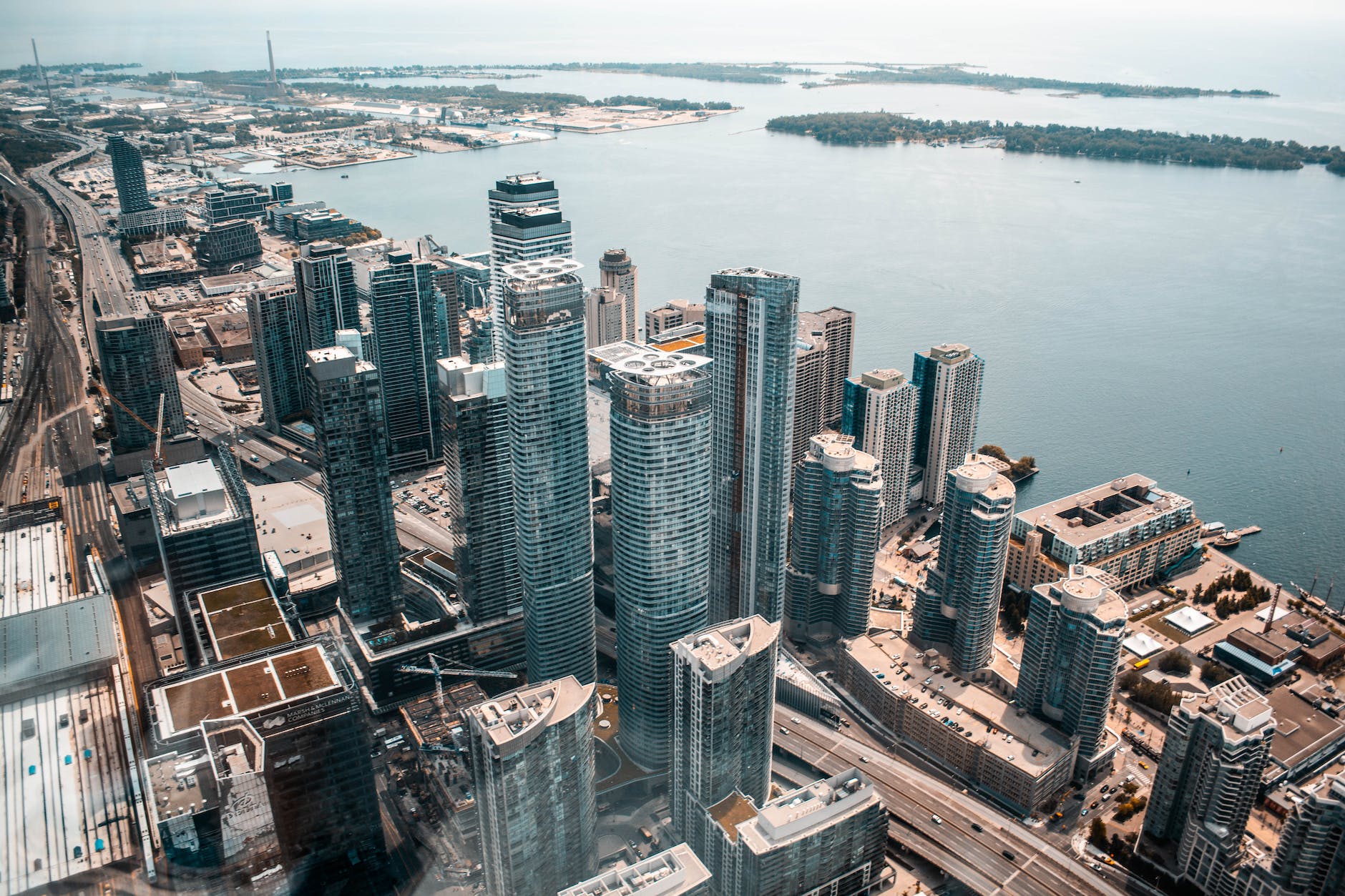 aerial photo of buildings near body of water